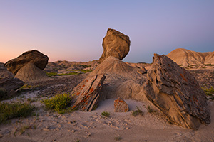 The badlands landscape at Toadstool Geologic Park is quiet in the twilight just before sunrise on a summer morning. - Nebraska Photograph