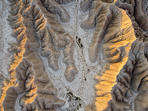 An abstract drone landscape photograph of the badlands Toadstool Geologic Park in western Nebraska. - Nebraska Photograph