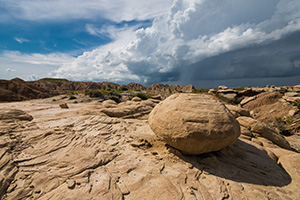 A storm rages above the landscape just beyond Toadstool Geologic Park in northwestern Nebraska. - Nebraska Photograph