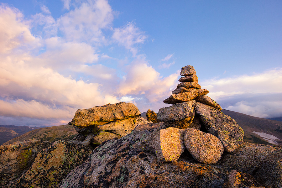 High up in Rocky Mountain National park a cairn stands witness to a beautiful morning across the tundra. - Colorado Photography