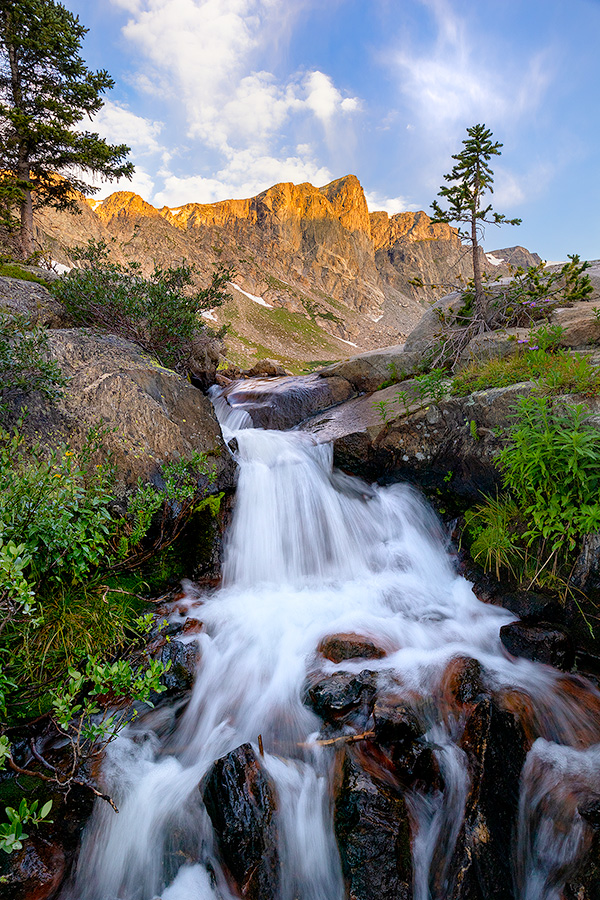 A scenic landscape photograph of a waterfall below Mirror Lake in the Rocky Mountain National Park, Colorado. - Rocky Mountain NP Photography