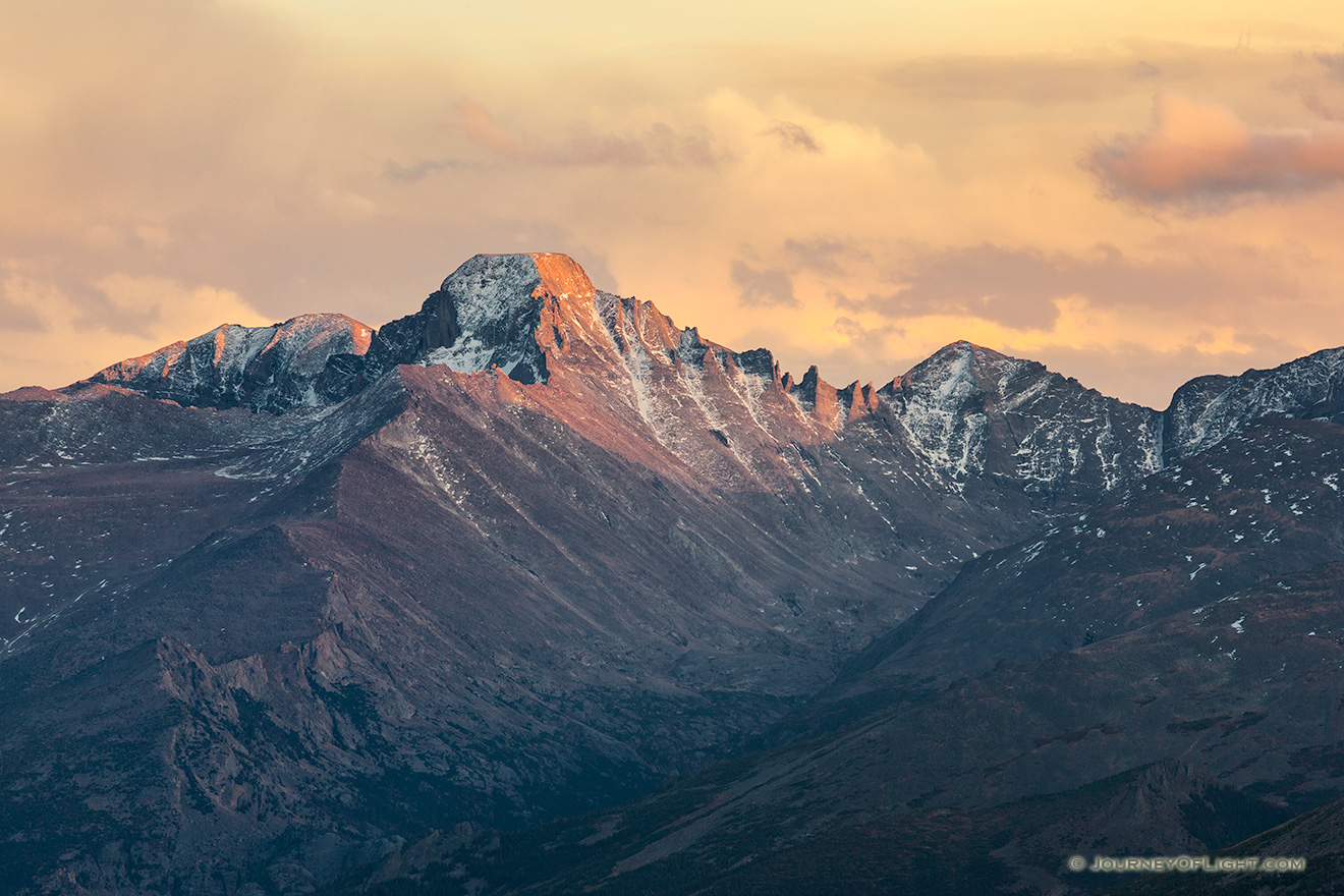 Long's Peak's western face glows with the last warm hues of sunset. - Rocky Mountain NP Picture