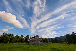 Landscape photograph of an old rustic barn at sunset in Rocky Mountain National Park, Colorado. - Colorado Landscape Photograph