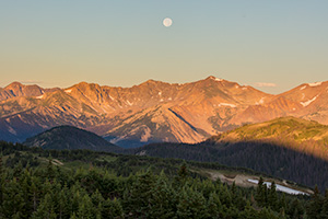 Landscape scenic photograph of the moon setting over the Never Summer Mountain Range, Rocky Mountain. - Colorado Landscape Photograph