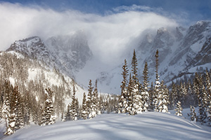 Hallet and Flattop are partially hidden by the blowing snow and clouds due to a large mid-May snowfall. - Colorado Landscape Photograph