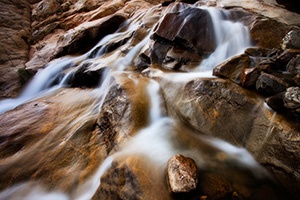 Water flows down Roaring River and into the Alluvial Fan near Horseshoe Park in Rocky Mountain National Park. - Colorado Photograph