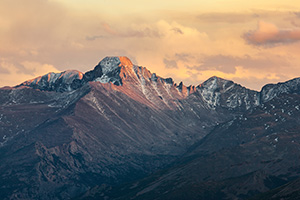 Long's Peak's western face glows with the last warm hues of sunset. - Colorado Photograph
