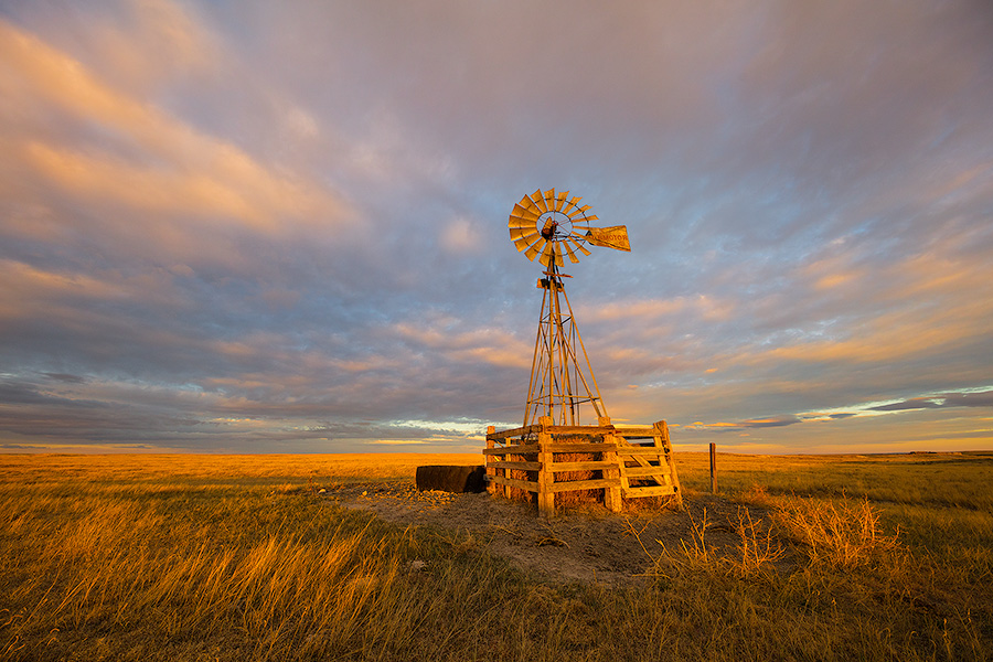 Scenic landscape photograph of a windmill at sunset at Oglala National Grasslands. - Nebraska Photography