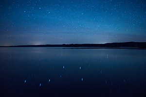 On a clear night at Niobrara State Park the stars shone brightly above the Missouri River.  In the reflection of the river the Big Dipper can be clearly seen. - Nebraska Landscape Photograph