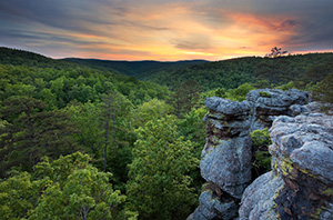 The last light of evening illuminates the clouds on the Kings Bluff trail in the Ozarks in Arkansas. - Arkansas Photograph