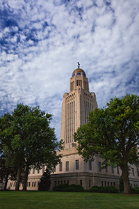 The Nebraska state capitol building in Lincoln was designed by famed architect Bertram Grosvenor Goodhue and was completed in 1932.  Incorporated in its design are several designs by Lee Lawrie and is crowned by the statue, 