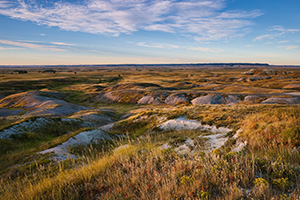 Morning comes and the sun shines across the grasslands of the Oglala National Grassland. - Nebraska Landscape Photograph Photograph
