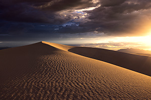 Scenic photograph of a sunset at White Dunes National Park, New Mexico. - New Mexico Photograph