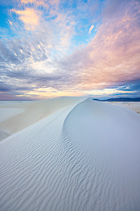 Scenic photograph of a beautiful sunrise at White Dunes National Park, New Mexico. - New Mexico Photograph