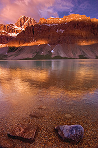 Bow Lake in Banff National Park at sunrise.  I awoke early in order to travel from Canmore to Bow Lake to capture the early sun hitting the mountains over Bow Lake. - Canada Photograph